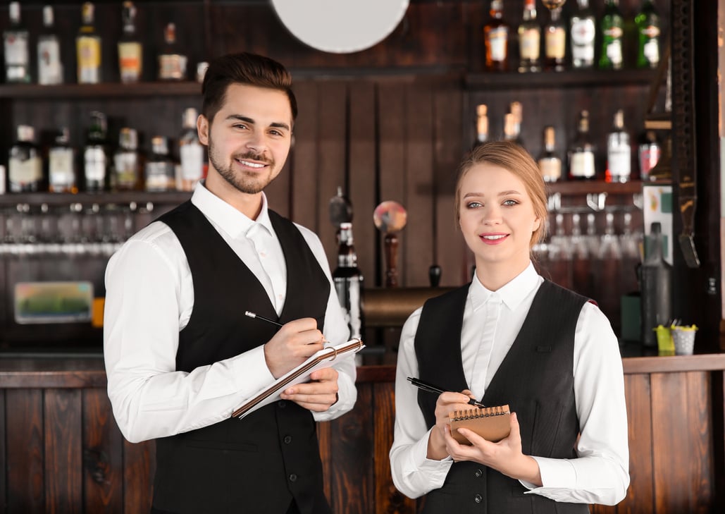 Young Waiters in Bar